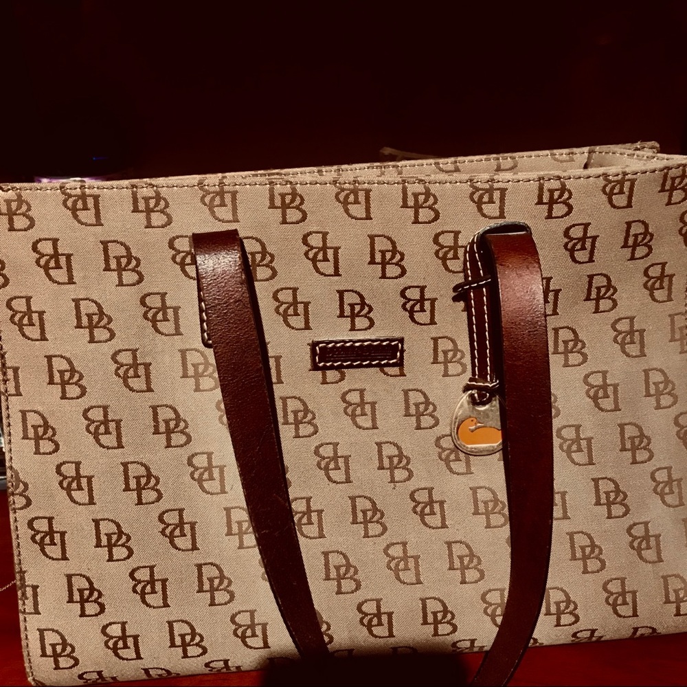 Dooney and Bourke East west canvas monogram tote